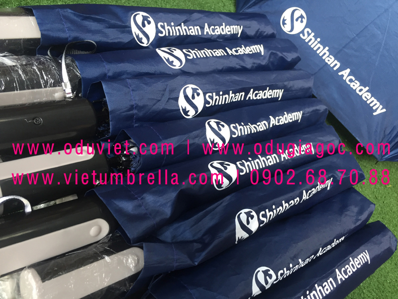 xưởng sản xuất ô dù cầm tay in logo quảng cáo